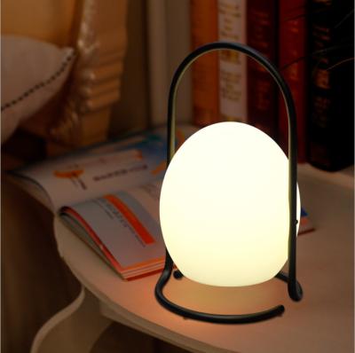 China Modern Portable USB Table Lamp Oval White Bedside Lamps in Bedroom Table for sale