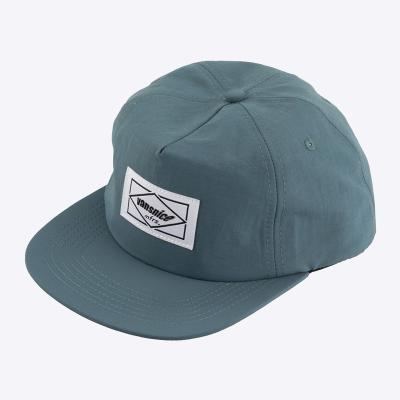 China Custom 5 Panel Woven Label COMMON Unsutrctured Snapback Hat for sale