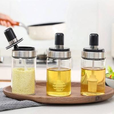 China Sustainable Spice Jar 200Ml Condiment Bottles Container Organizer Honey Jar With Spoon With Brush for sale