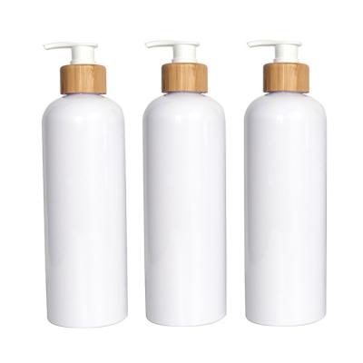 China White Personal Care Products Large Capacity Plastic Lotion Pump Bottle 500ml With Strong Pump Bamboo Wooden Head for sale