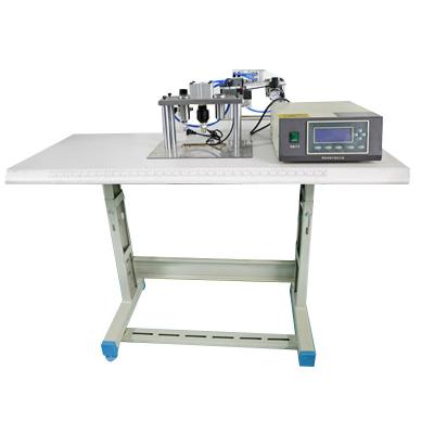 China Edge Semi Automatic Disposable Mask Sealing Machine for sale