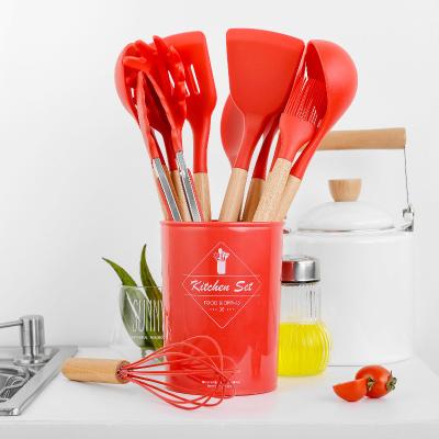 China Kitchen Stocked Utensils Set Silicone Cookware Spatulas Heat Resistant Kitchen Tools Wooden Handle With Rack for sale