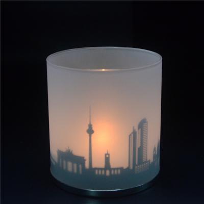 China Romantic Home Decoration Design Tall Candlelight Table Round Glass Candle Jars With Metal Shade Pattern for sale