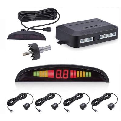 China Waterproof 12 Volt Quality Universal Car LED Display Parking Sensor System Radar Reverse Backup Buzzer Alarm Kit 4 Warning Eyes Waterproof for sale