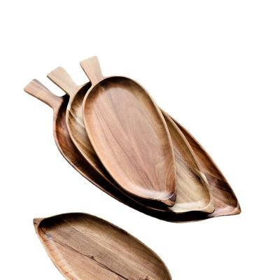 China Sustainable Acacia Wood Dish Leaf Shape Solid Wood Wood Dish Dessert Bread Dish Nuts Snack Plates Cake Tray Kitchen Utensils for sale