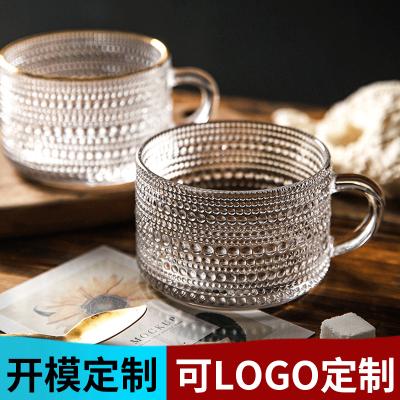 China Beautiful Modern Simplicity Gold Coffee Mug Embossed INS Nordic Transparent Glass Mug With Handle Drinkware Mug Pearl Milk Mug for sale