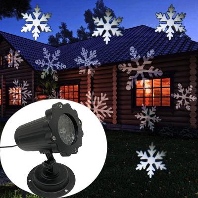 China Outdoor Decoration LED Snowfall Projection Lamp Christmas Snowflake Laser Projector Indoor Waterproof Lights for sale