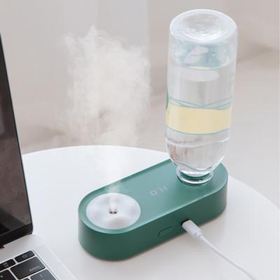 China USB Rechargeable Aroma Essential Oil Air Diffuser Humidificador Portable Car Water Bottle Humidifier with Night Lamp for Home Trave for sale