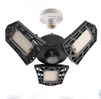 China Adjustable Warehouse 60W LED Garage Bulb Three Panel Grow Leaf Foldable Light for Garage Ceiling Workshop Gym for sale