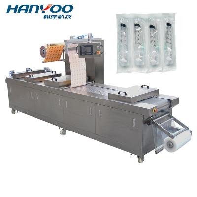 China DPS-520 Flexible Packaging Automatic Clamp Thermoforming Vacuum Packing Machine For Medicine for sale