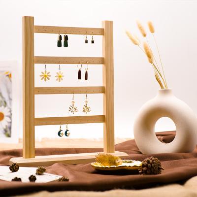 China Store Display Home Decoration Hot Sales New Wooden Wall Mounted Earring Display Jewelry Props for sale