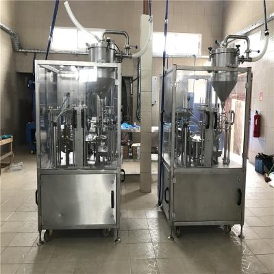 China Automatic Rotary Cup Beverage Cup Filling Capping Machine Cup Filling Sealing Machine for sale