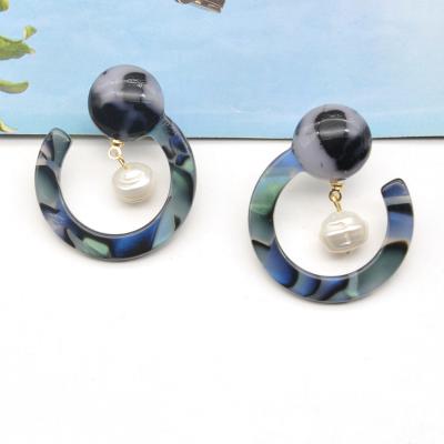 China Newest Design Acrylic Shell Female Korean Style Fashionable Pearl Stud Earrings for sale