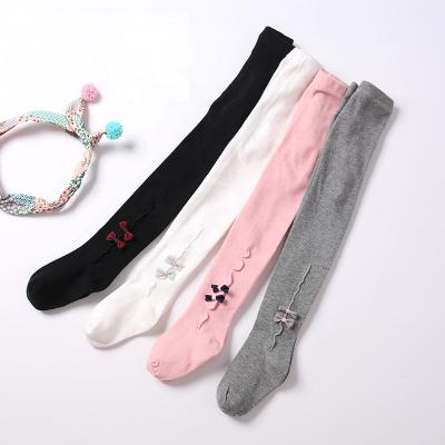 China Color Fade Proof Winter Baby Girl Pantyhose Bow Leg Warmers Fashion Knitted Cotton Stocking Girls Pantyhose for sale