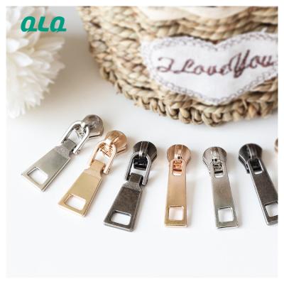 China Nickel Free Zipper Slider Metal Zipper Pull Head Tain Head Slider for Clothes Bags Wholesale Custom Zinc Alloy Shoes for sale