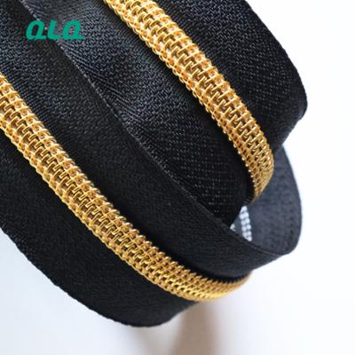 China Durable nylon zipper with high quality gold teeth with customized size 3#, 5#, 7#, 8#, 10# for sale