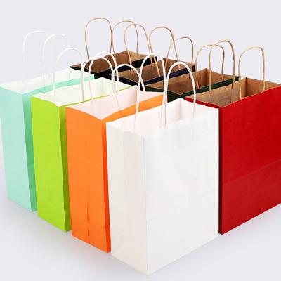 China Recyclable Kraft Paper Gift Bags With Twisted Handles , Small Party Paper Candy Bags for sale