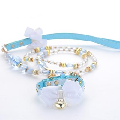 China Viable White Teddy Blue Bow Pearl Collar Dog Chain Pet Collar And Leash for sale