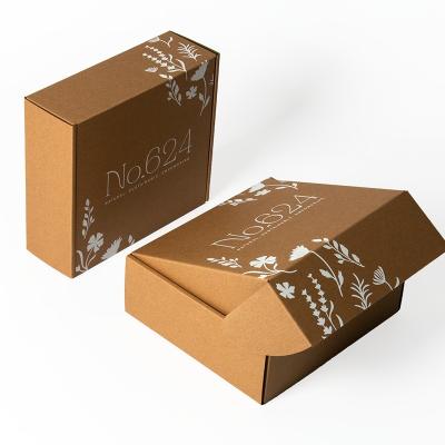 China Kraft Cardboard Clothing Packaging Box Silk Screen White Ink Design Custom Size for sale