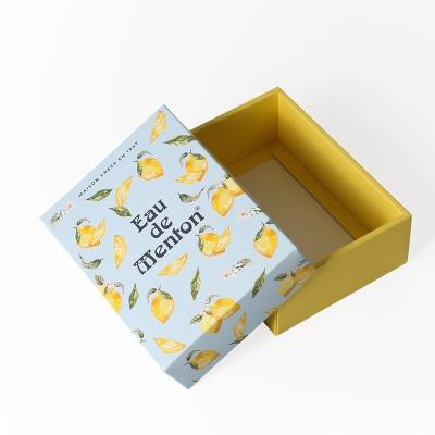 China Custom Logo Lid and Base Box Aesthetic Appeal Small Watch Paper Box Printed in Light Yellow on Thick White Paper Board for sale