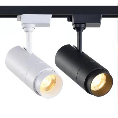 China Contemporary Black And White Rotating COB Apparel Store Track Downlight Outdoor Mounted Light for sale