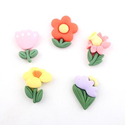 China Europe hot sale cute kids hair ornament accessories flower flat back resin cabochon for diy for sale