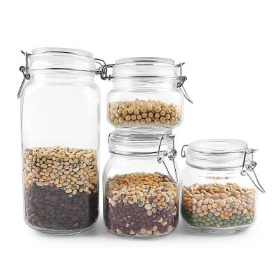 China Food Free sample 500ml 1000ml storage jar airtight lead free sealed glass kitchen honey food storage glass jar with clip lid for sale