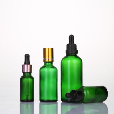 China Personal Care Blue And Green Custom-Produced Essential Oil Glass Dropper Bottle for sale