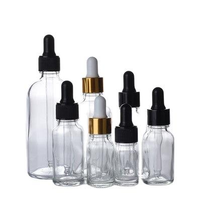 China 5ml 10ml 15ml 20ml 30ml 50ml Personal Care Glass Clear Essential Oil Bottle Cosmetic Dispenser Bottle With Pressed Tip Dropper Rubber Bottle for sale