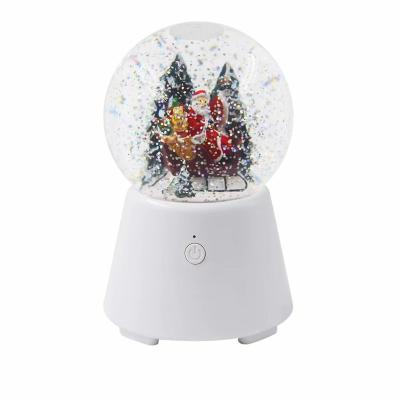 China No Christmas Snow Globe With Blowing Snow Portable Music Player Wireless Speaker for sale