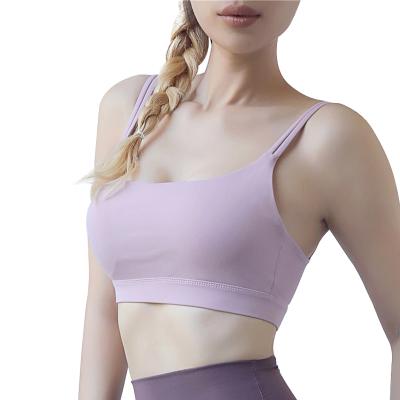 China New Breathable Comfortable Sports Bras For Women Yoga Workout Padded Bras Solid Color Tank Tops For Girl for sale