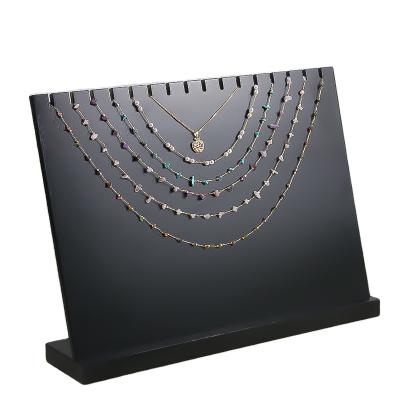 China Retail Stores Tops Modern Acrylic Jewelry Necklace Display Gold Necklace Display Rack for sale