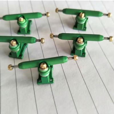 China New Kids Toys 32mm Solid Fingerboard Trucks Axle Green 32mm Single Trucks New 10 Colors With Lock Nuts And Tool for sale