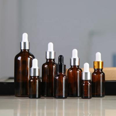 China 100ml Frying Oil Eye Face Essential Oil Cosmetic Packaging Amber Round Glass Dropper Bottle for sale