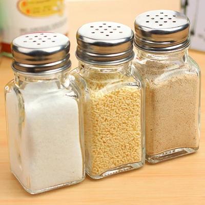 China New Viable Clear Glass Condiment Bottle Spice Salt Pepper Bottle 50g With Hollow Cover for sale