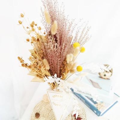 China Boho Decor Small Flower Gift Package Arrangement Wedding Decorate Dried Palm Leaves Bind Preserved Dried Flower Bouquet for sale