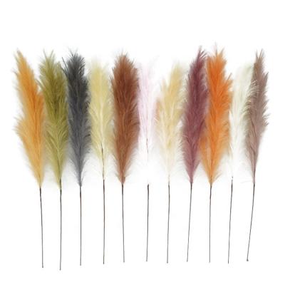 China Popular Durable Artificial Simulation Pampas Grass Flower Large Fluffy Decoration Large 120cm Reed For Wedding Simple Decoration for sale