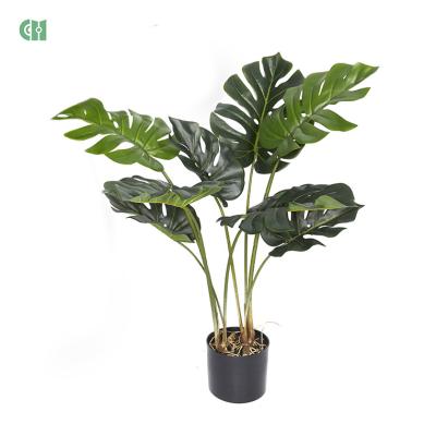 China 2021 New Custom Hot Sale Minimalist Artificial Monstera Pe Plant, Artificial Plant For Diary for sale