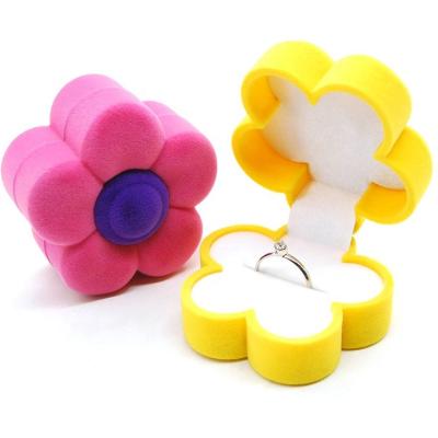 China Plastic+velvet maker stain gift jewelry packaging box flocking jewelry box plum blossom shaped ring box for sale