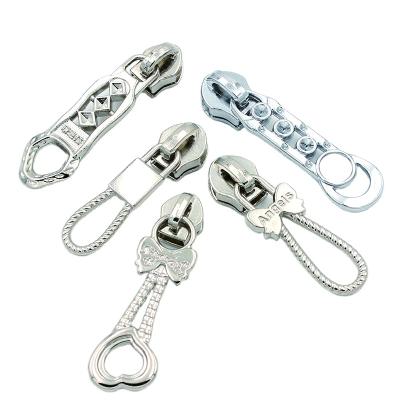 China Garment Metal Zipper Puller Zipper Puller Logo Bag Zipper Custom Metal Brand Zipper Pull Logo for sale