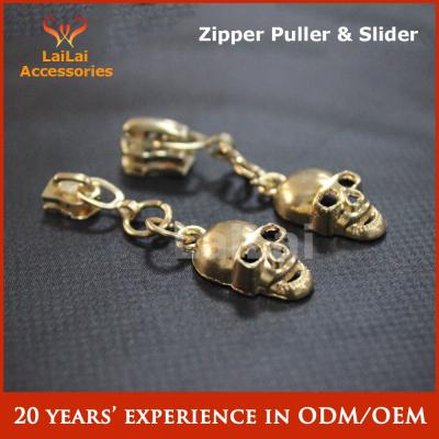 China Nickel Free Wholesale Golden Skull Decorative Zipper Pulls For Garment for sale