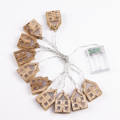 China 10 LED String Lights 3D Light House Battery Operated Wooden String Light For Christmas Decoration for sale