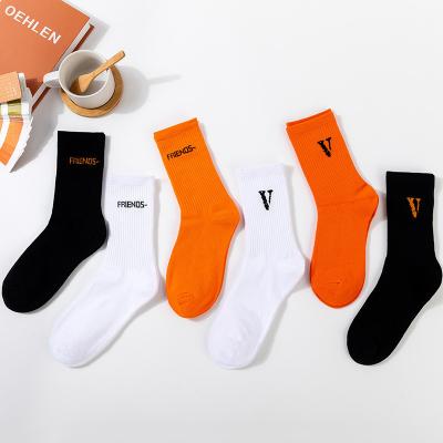 China Wholesale Casual Jacquard Knitted Breathable Letter Designer Socks Brand Crew Cotton Socks Funny Sports Custom Socks for sale