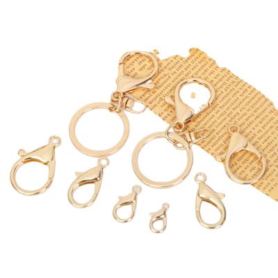 China Shoulder Strap Hook Buckle Fasteners 12mm 10mm Large Size Metal Alloy Gold Jewelry Hooks Key Chain Bracelet Necklace Lobster Huggs Metal Key Chain for sale