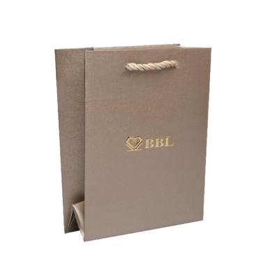 China Custom Logo Printed Folding Box Gift Biodegradable Boxes Fancy Paper Bag for sale