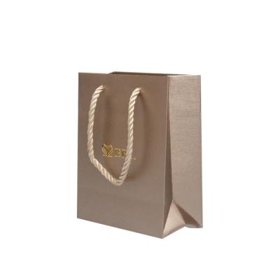 China Custom Logo Printed Folding Box Gift Recyclable Boxes Fancy Paper Bag for sale