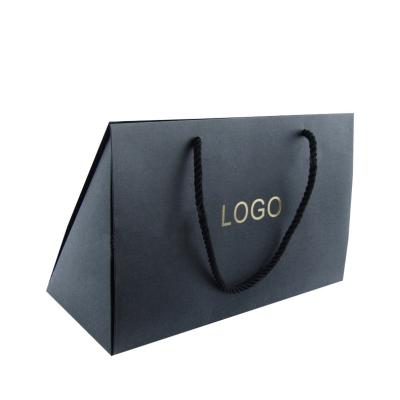 China Biodegradable Wholesale Coated Paper Packaging Bags With Own Logo for sale