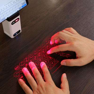 China Laser Wireless Blue Virtual Keyboard Tooth Projection Portable Keyboard and Mouse for Mobile Computer for sale