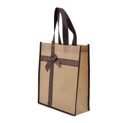 China Wholesale unique reusable tnt printed non woven shopping bag handled gift bow logo packaging handle pp bag for sale