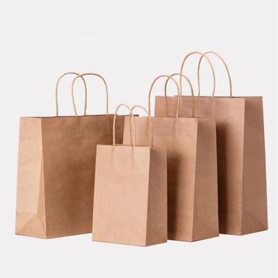 China Disposable Plain Horizontal Brown Kraft Paper Bag With Two Strings Handle Custom 130 Gsm Newsagent Bags for sale